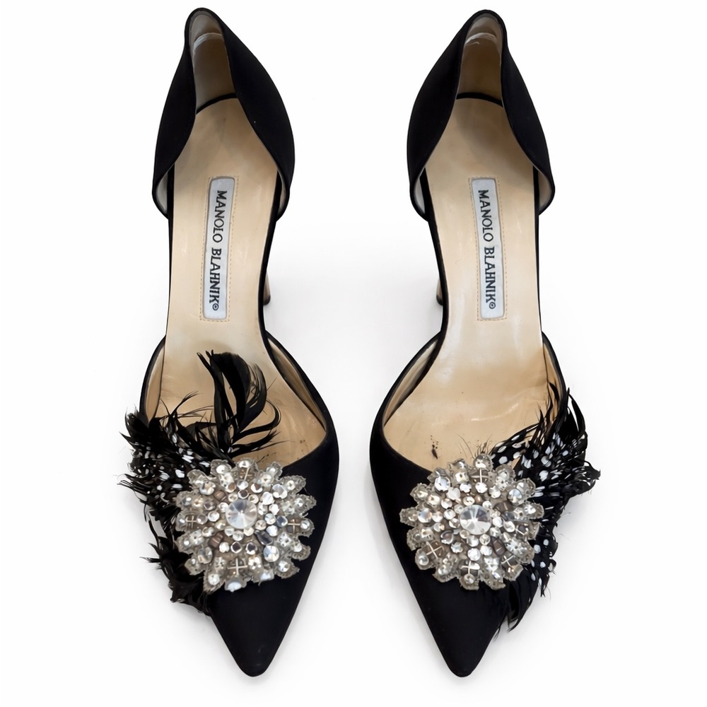 Authentic manolo blahnik black heels. Very good condition.